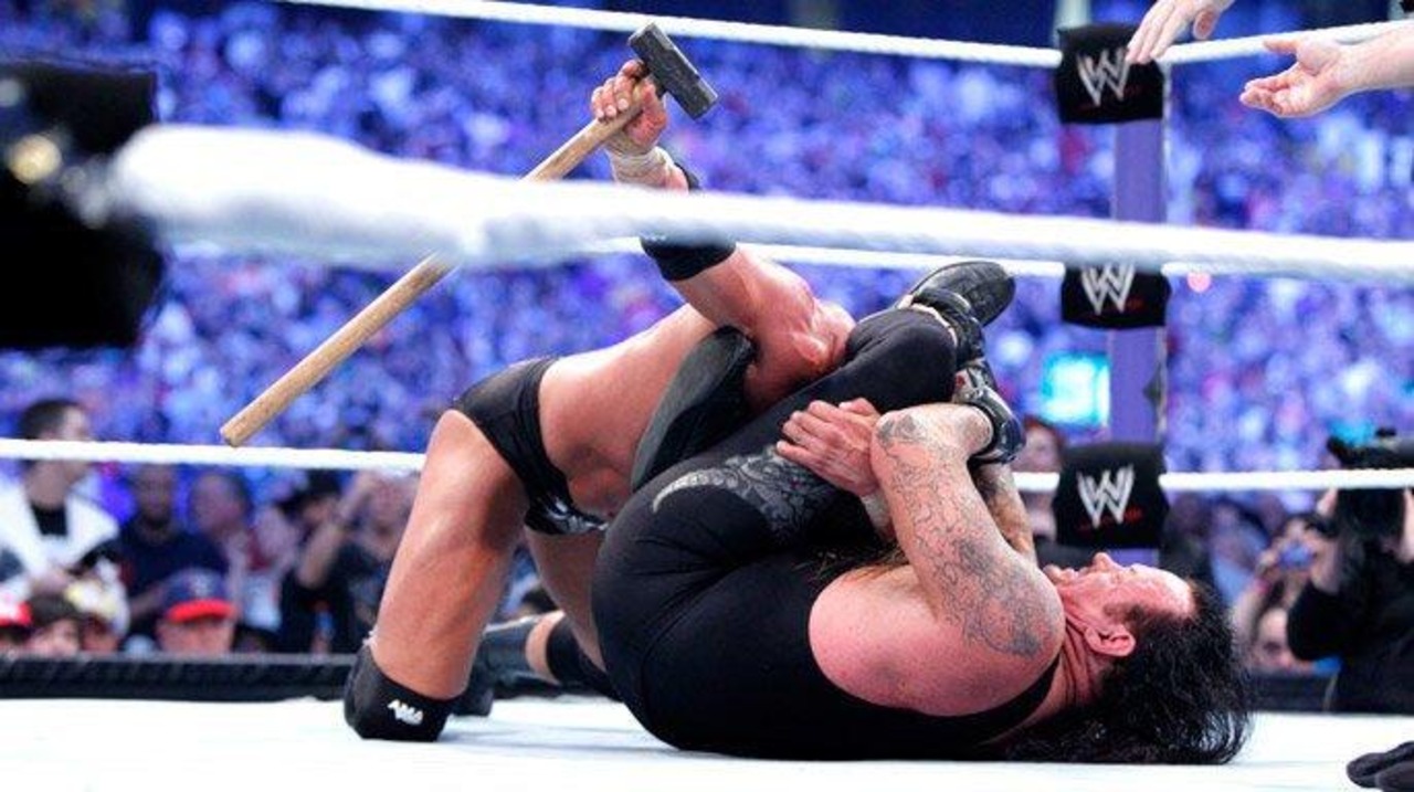 Triple H The Undertaker WrestleMania 27 1 