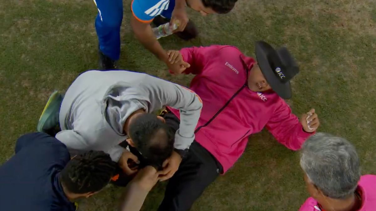 Umpire Rohan Pandit Wriggles In Pain